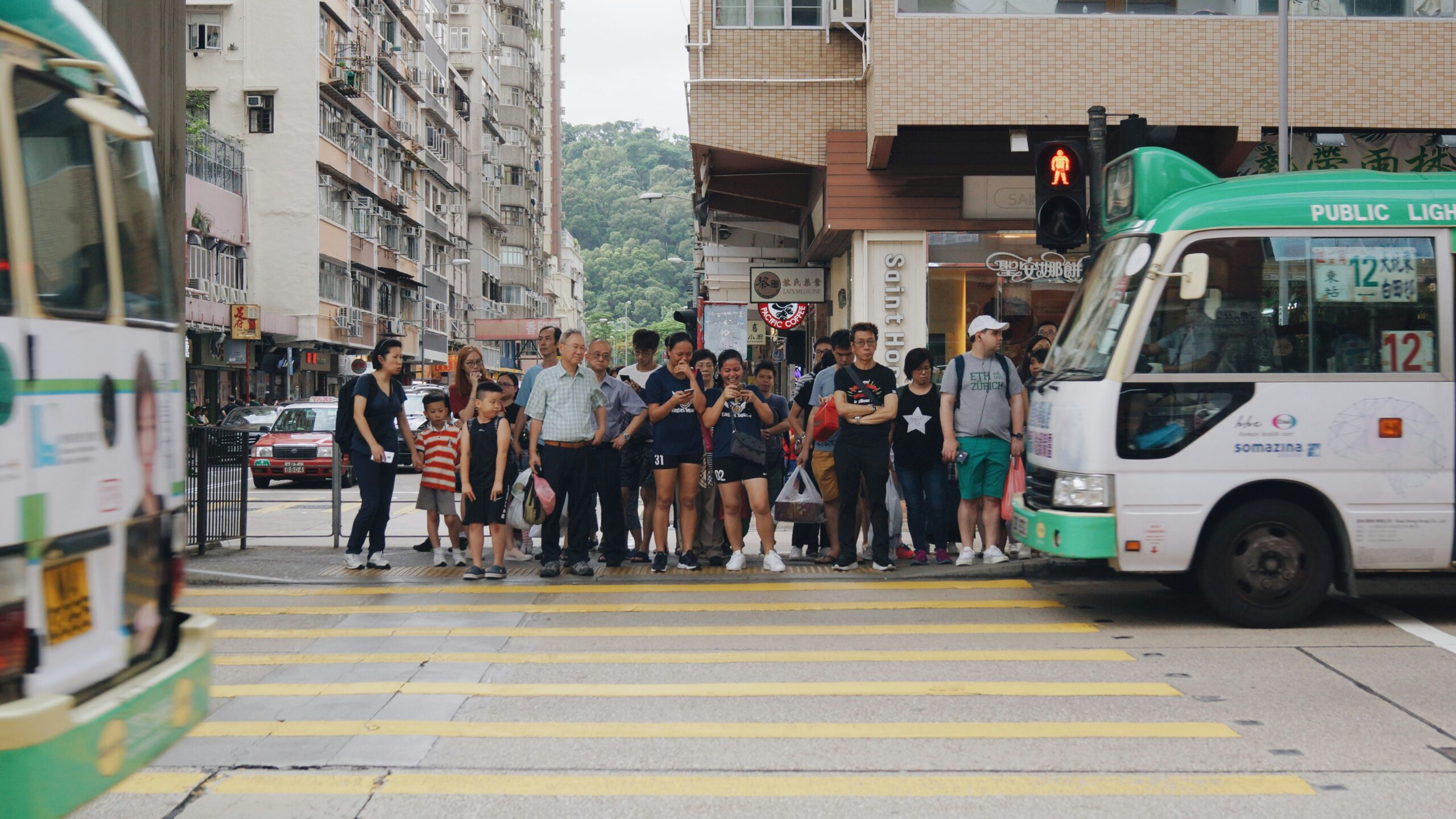 unknown persons standing outdoors